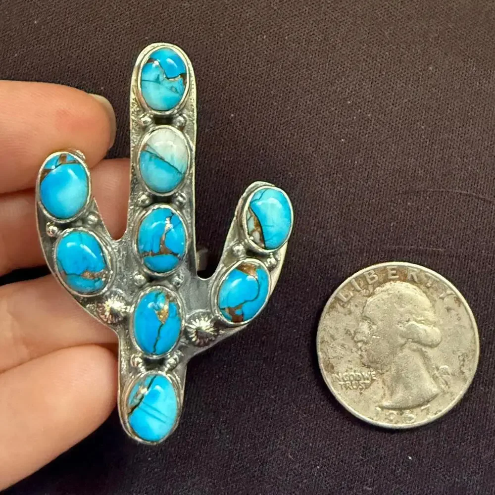 Sterling silver handmade turquoise catches ring adjustable size